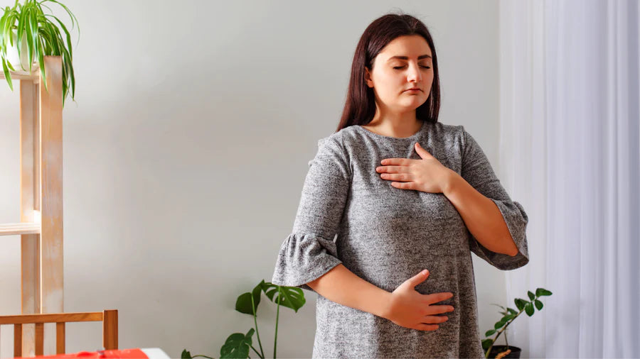 Woman doing breathing exercises