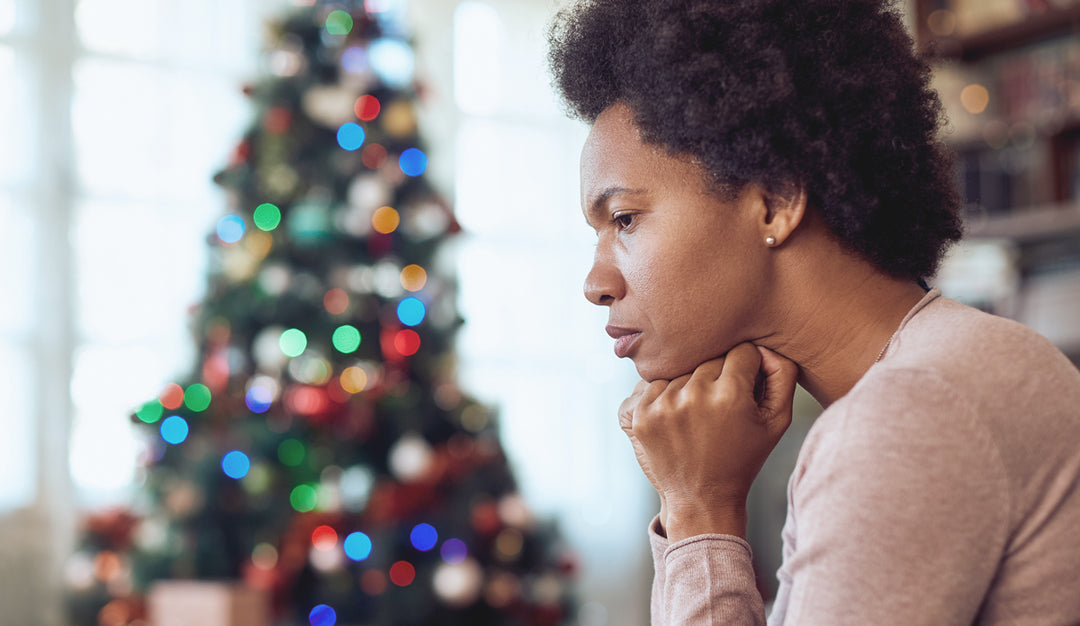 Sitting woman getting anxious and stress in holiday celebration